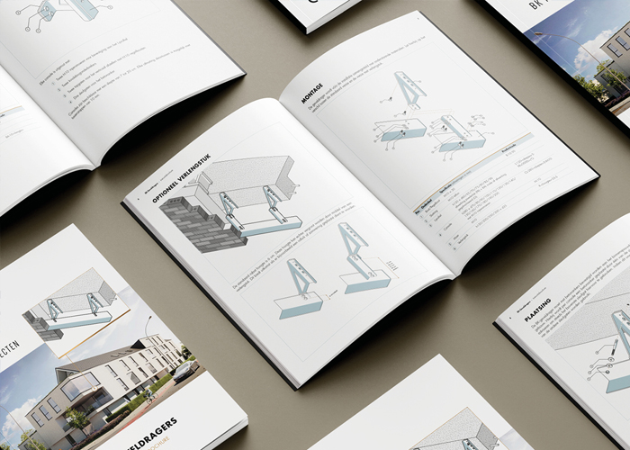 Open printed user manual displaying structured technical illustrations, labelled diagrams and step-by-step installation instructions in a clean, professional layout.